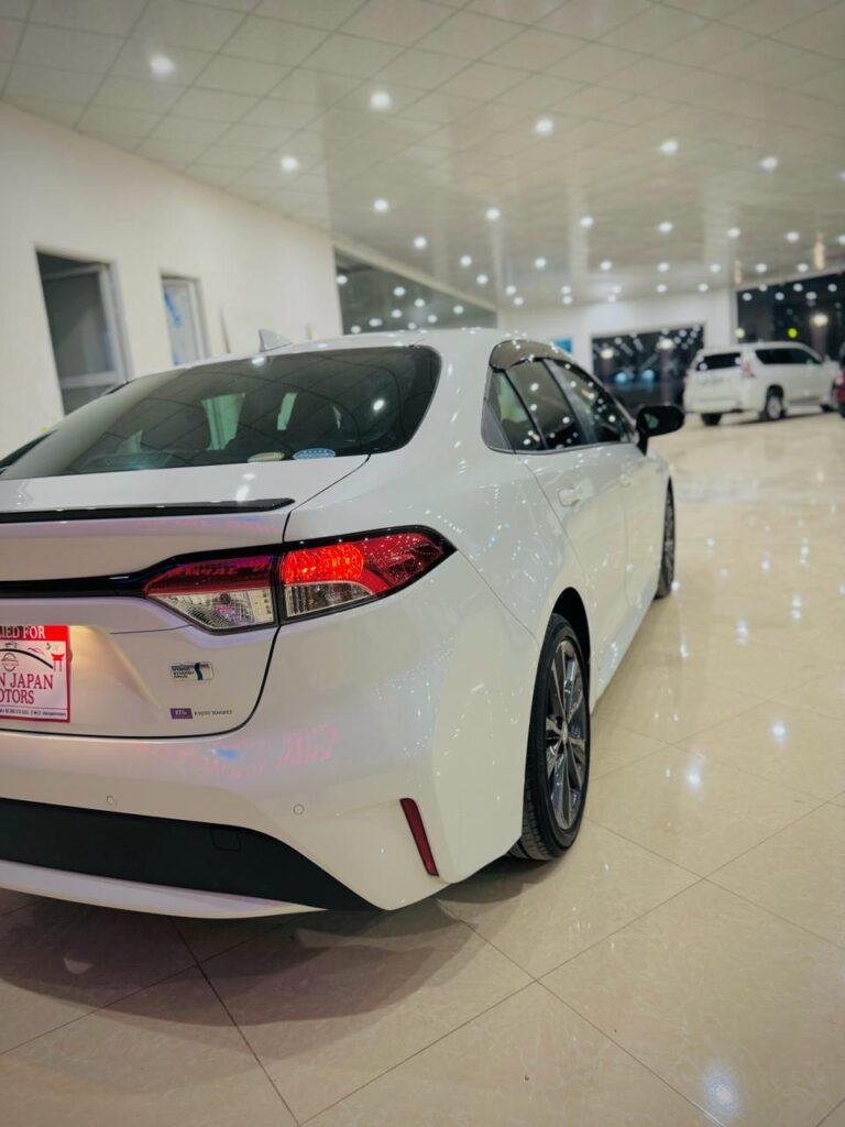 Toyota Corolla Axio Hybrid in Pearl White 2020 Khan Japan Motors